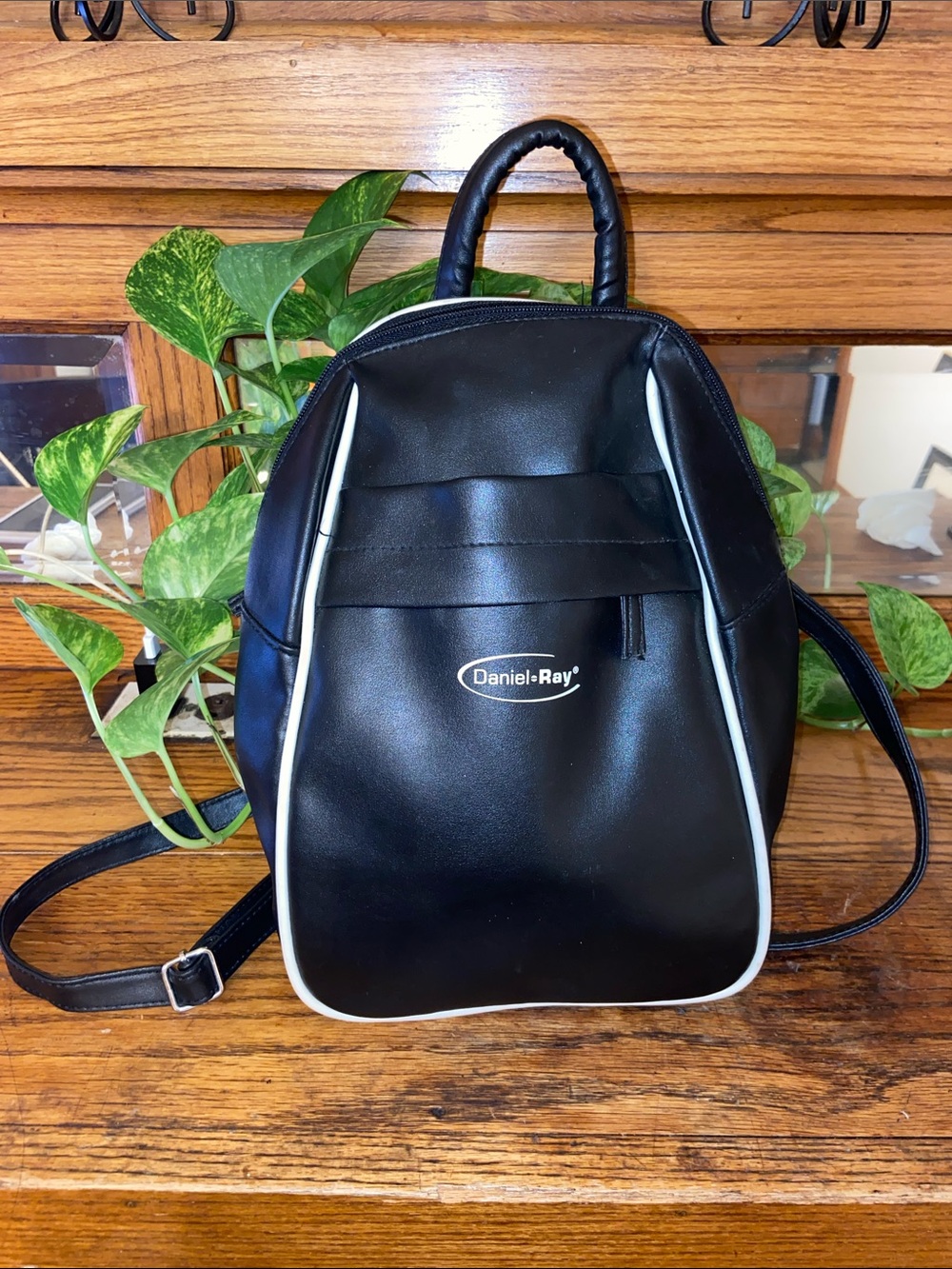 Daniel Ray Sleek Black Mini Backpack with White Piping